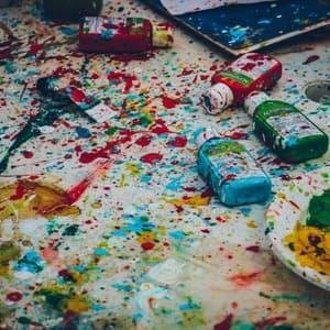 Paint bottles spread on ground